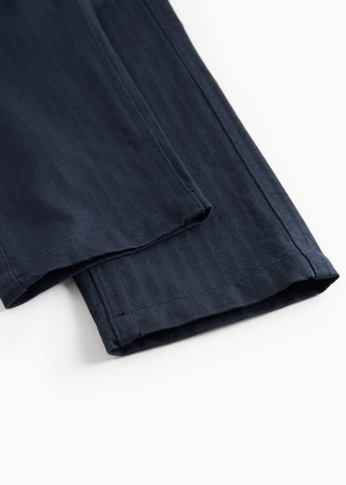 Dark blue party pants with button closure and pockets for children