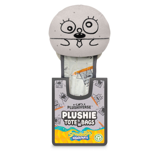 A round, grey plush toy with cartoonish eyes and mouth, wearing a tie, partially tucked into a dark grey and colorful packaging labeled "Plushiverse DoodleBob Plushie Tote Bag" featuring Nickelodeon branding, made from recycled plastic bottles.