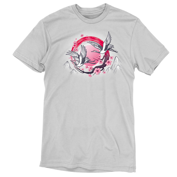 Premium Cotton T-shirt_TeeTurtle Red-Crowned Cranes silver gray t-shirt featuring an illustration of two cranes in flight with pink sakura blossoms, a red circular element, and stylized mountains in the background.