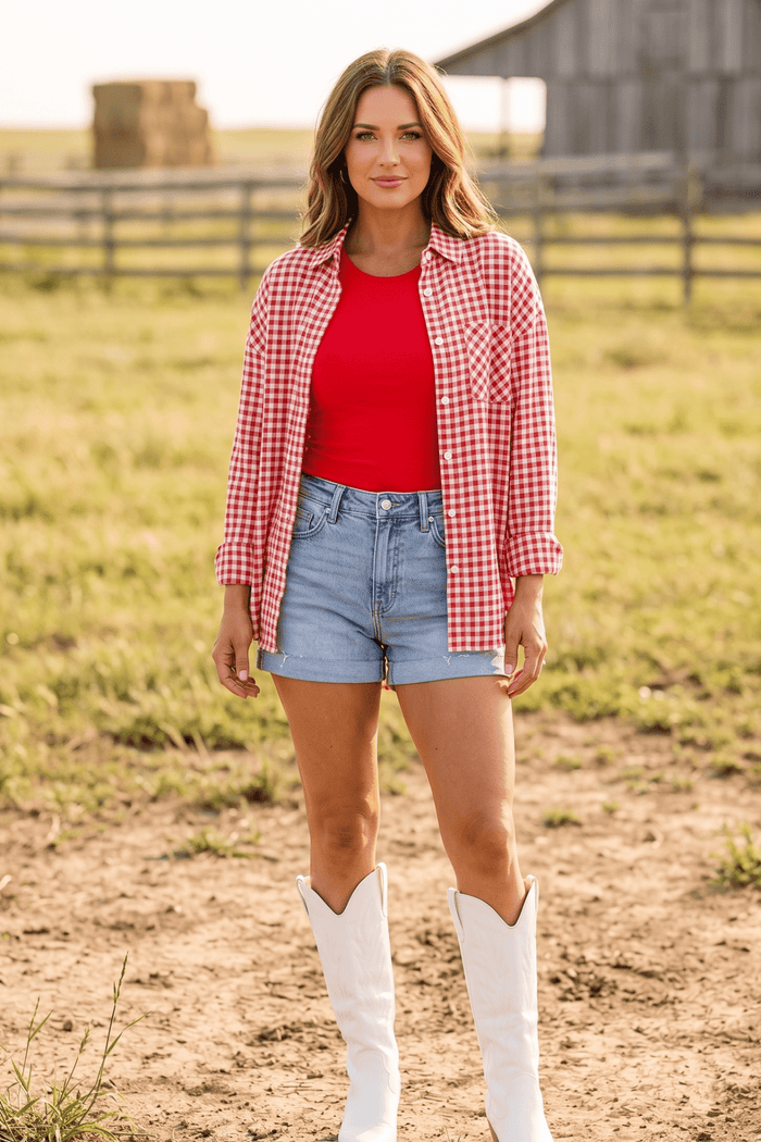 Light wash super high rise denim shorts with distressed details, raw hem, comfort stretch denim, and relaxed A-line silhouette.