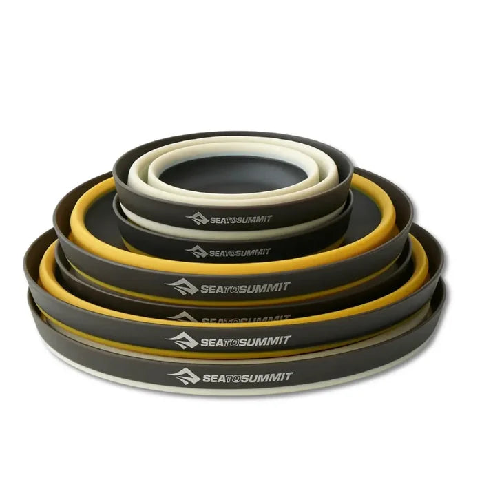 Sea To Summit Frontier 6 piece ultralight dinnerware collpased and nestled on a white background