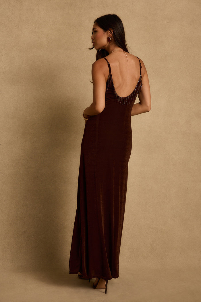 Back view of espresso brown maxi dress with beaded fringe trim along scoop back.