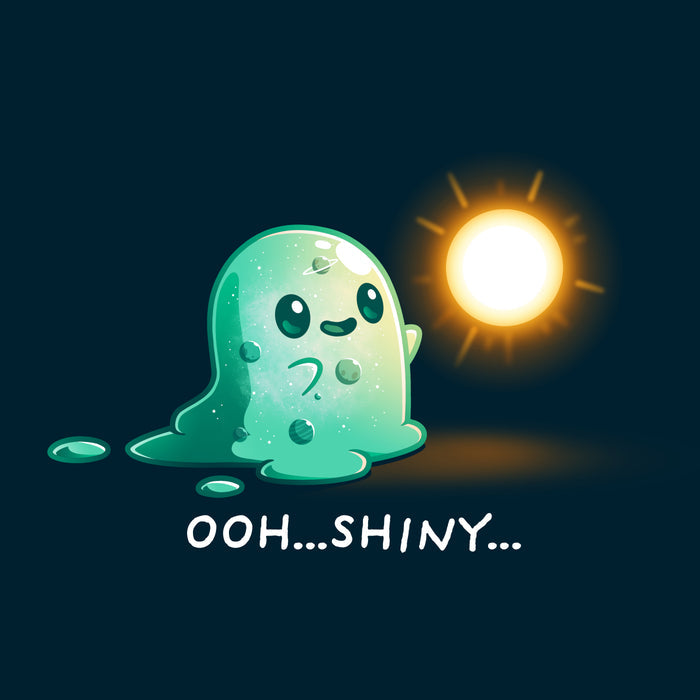 Premium Cotton T-shirt_TeeTurtle Shiny Distraction navy blue t-shirt featuring a slime creature staring in awe at a glowing, golden orb.