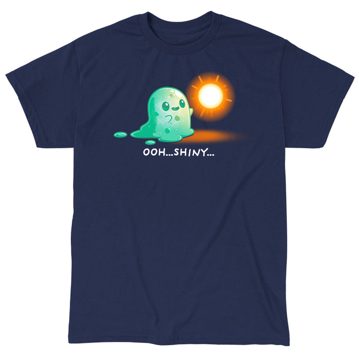 Classic Cotton T-shirt_TeeTurtle Shiny Distraction navy blue t-shirt featuring a slime creature staring in awe at a glowing, golden orb.
