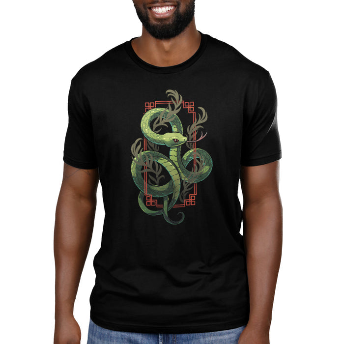 Premium Cotton T-shirt_TeeTurtle black Sinuous Snake apparel featuring a green snake coiled around leafy green plants and red frame.