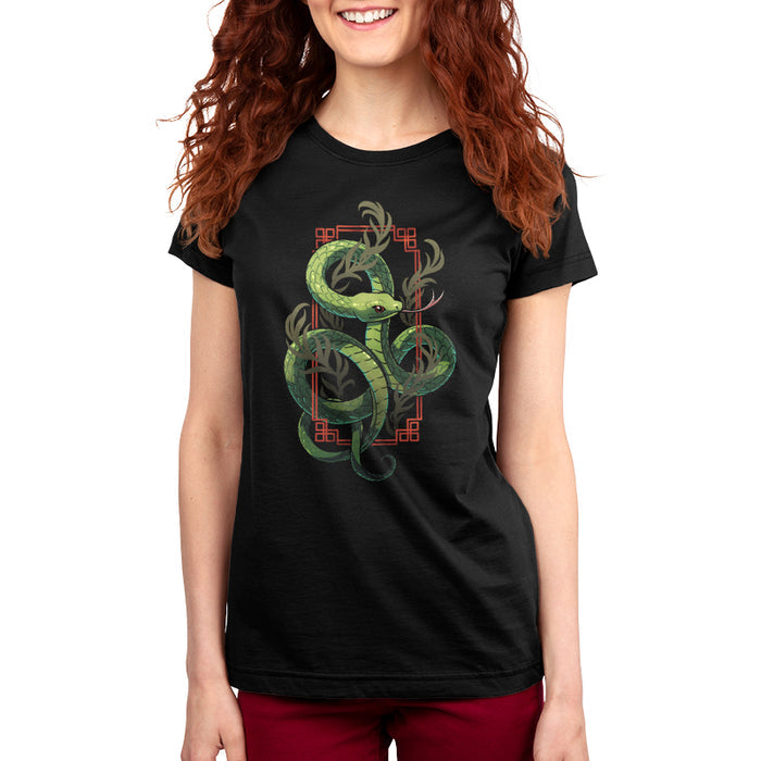 Premium Cotton T-shirt_TeeTurtle black Sinuous Snake apparel featuring a green snake coiled around leafy green plants and red frame.