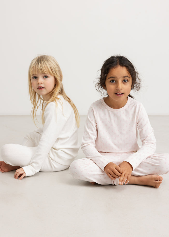 White nightgown for two children, long-sleeve top and long pants