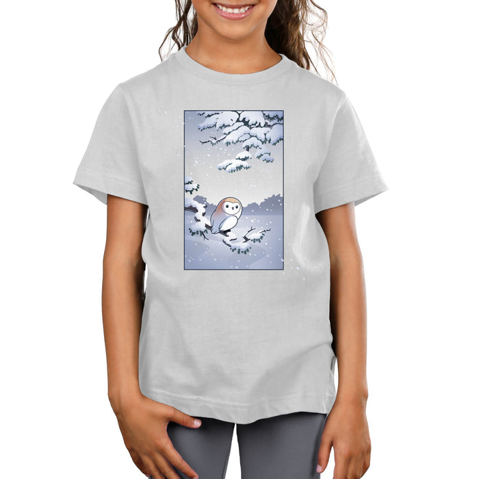 Premium Cotton T-shirt_TeeTurtle silver gray Snowy Owl apparel featuring a barn owl perched on a snowy branch with snow falling in the background.