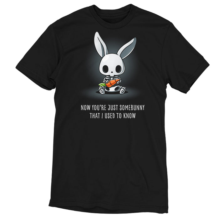 Premium Cotton T-shirt_TeeTurtle black Somebunny That I Used to Know apparel featuring a bunny skeleton sitting down holding a giant carrot with the caption, “Now You’re Just Somebunny That I Used to Know“.