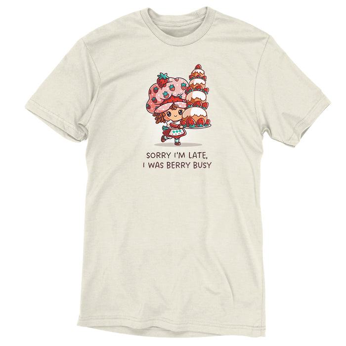 Premium Cotton T-shirt_TeeTurtle natural heather Sorry I Was Late, I Was Berry Busy apparel featuring Strawberry Shortcake holding a tall, large strawberry cake, and the caption, "Sorry I Was Late, I Was Berry Busy".