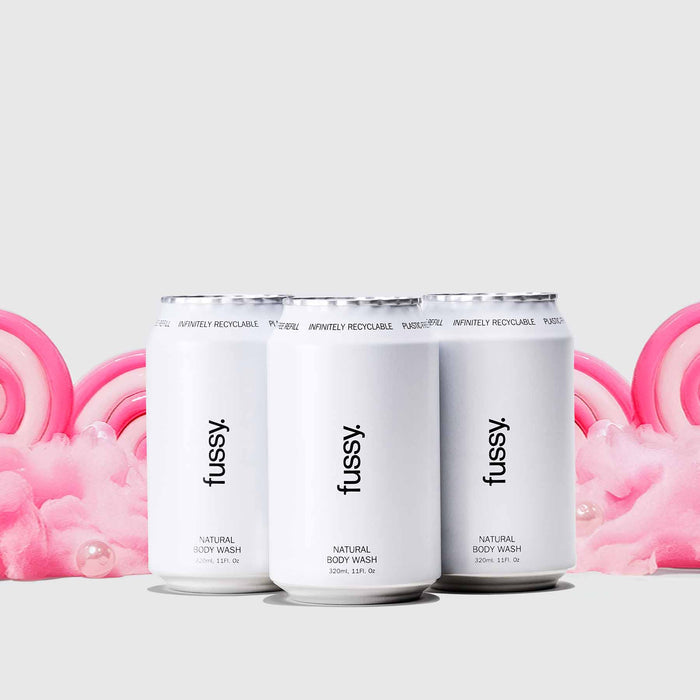 Fussy's Sugar Crush Refill Pack featuring three refills set against a backdrop of pink cotton candy and lollipops.