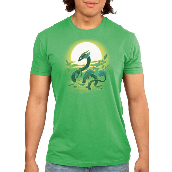 Premium Cotton T-shirt_TeeTurtle Swamp Dragon apple apparel featuring a magical dragon coming up out of a swamp covered in greenery with a sun setting in the background.