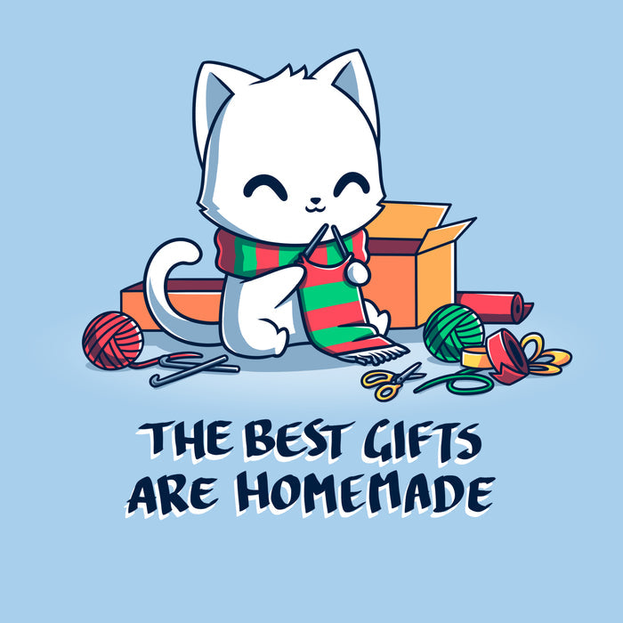 Premium Cotton T-shirt_TeeTurtle light blue The Best Gifts are Homemade apparel featuring a white cat crocheting a red and green scarf, and surrounded by crochet materials, such as crochet hooks, yarn, and a box, with the caption, "The Best Gifts are Homemade".