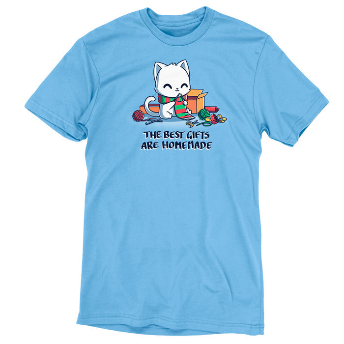 Premium Cotton T-shirt_TeeTurtle light blue The Best Gifts are Homemade apparel featuring a white cat crocheting a red and green scarf, and surrounded by crochet materials, such as crochet hooks, yarn, and a box, with the caption, "The Best Gifts are Homemade".