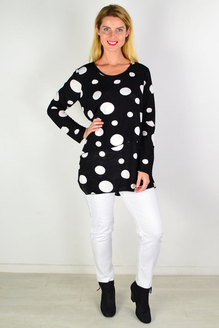 White spot crossover swing tunic top by Caroline Morgan, featuring a relaxed fit and stylish design, displayed on a hanger.