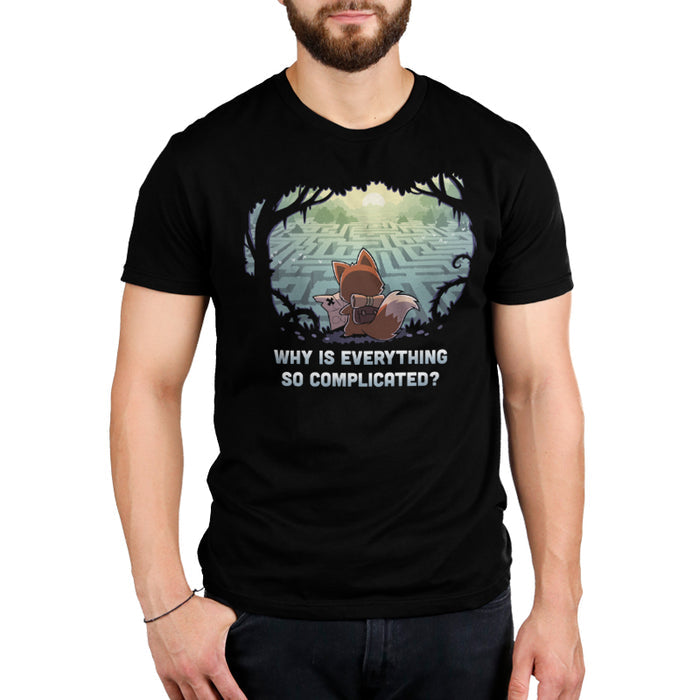 Premium Cotton T-shirt_TeeTurtle black Why Is Everything So Complicated? apparel featuring a fox with a backpack holding a map in a forest looking over at a large maze below.