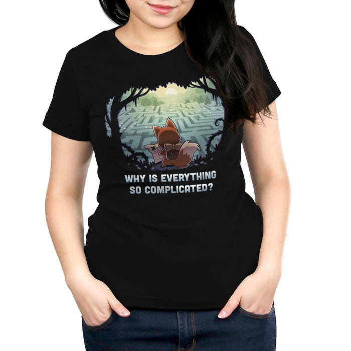 Premium Cotton T-shirt_TeeTurtle black Why Is Everything So Complicated? apparel featuring a fox with a backpack holding a map in a forest looking over at a large maze below.