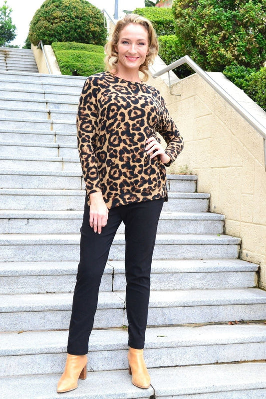 Caroline Morgan Wild Side Drop Shoulder Fleece Tunic Top with animal print, long sleeves, and relaxed fit, ideal for casual wear.