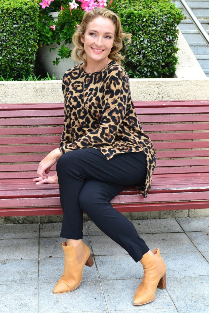 Caroline Morgan Wild Side Drop Shoulder Fleece Tunic Top with animal print, relaxed fit, and drop shoulder design.