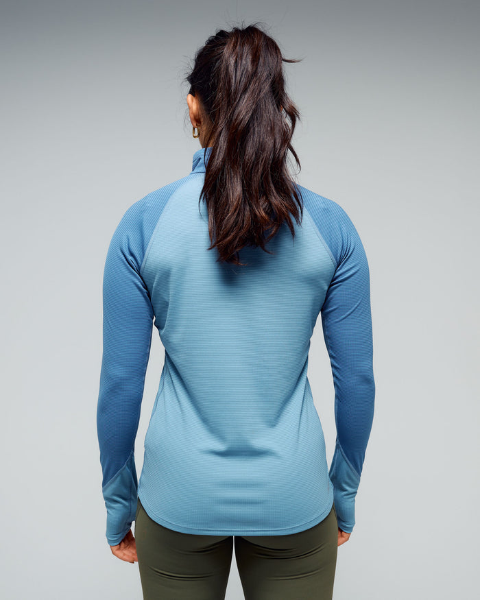b1173_nwy_womens_kmd_action_quarter_zip_baselayer_top_f_1768348918000